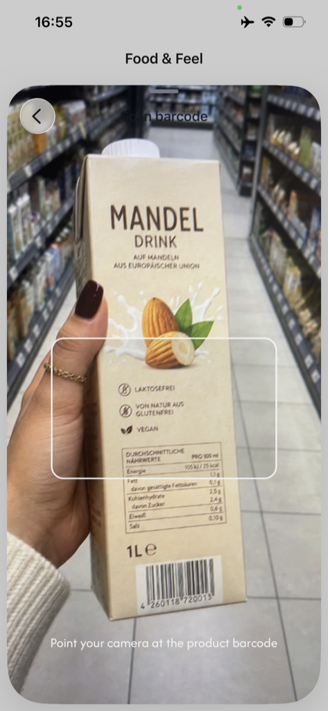 Barcode food scanner: scanning a product barcode in the supermarket to check it against food intolerances